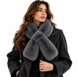 Grey plush crossover neck scarf worn by a model