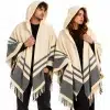 Women and man wearing an ivory and grey open hooded wool blend shawl